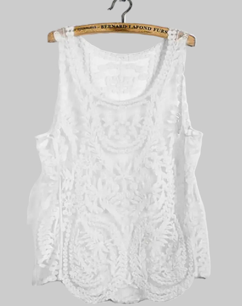 White lace tank top on a hanger against a white background